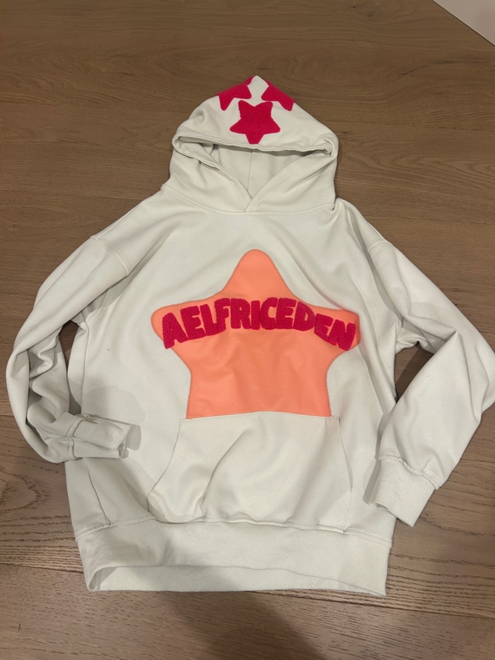 Aelfric Eden White Hoodie with Pink Logo and Peach Star